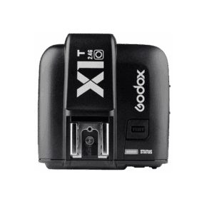 Top of X1T Godox controller on white background